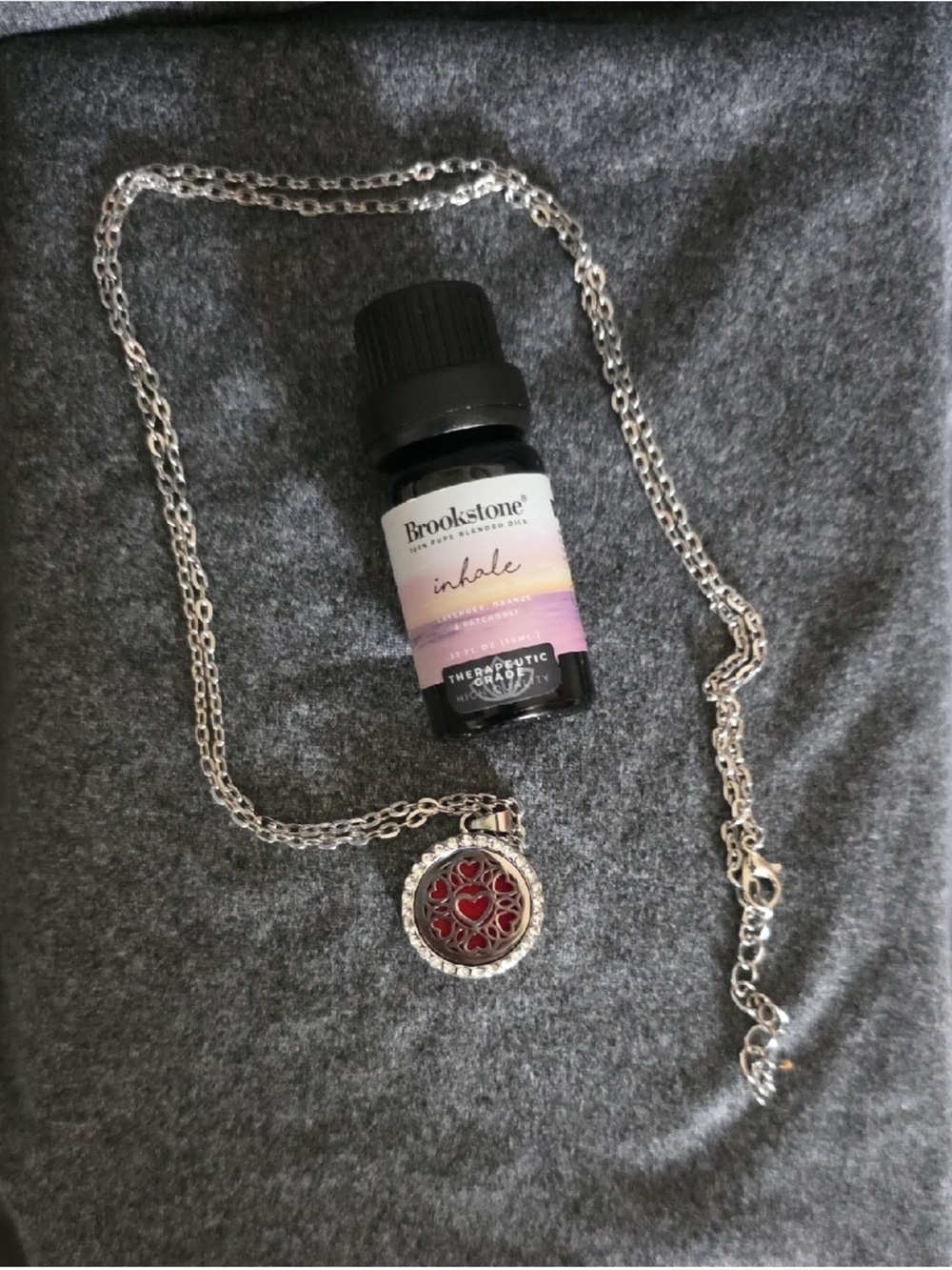 Brookstone "Inhale" Aromatherapy Oil & Silver Aromatherapy Diffuser Necklace